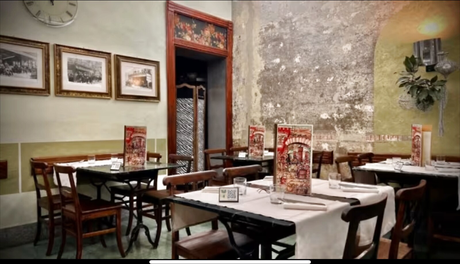 Historic room with antique clock and frescoes