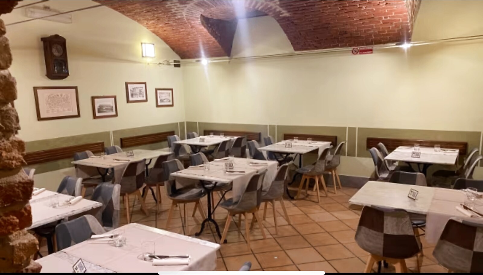 Room with exposed brick vault